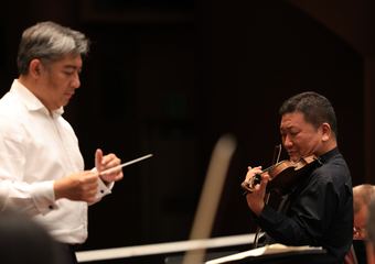 Conductor Adrian Prabava and violinist Edwin E.S. Kim with the Stuttgart Philharmonic